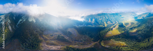 Flight over the misty mountain Syvulya