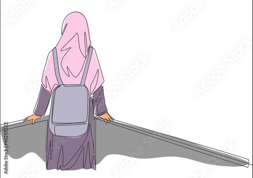 One single line drawing of young beauty middle east muslimah wearing burqa and carrying bag, back view. Traditional Arabian woman niqab cloth concept continuous line draw design vector illustration