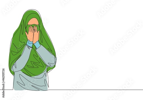 Single continuous line drawing of young cute saudi arabian muslimah wearing burqa and covering face with hands. Traditional muslim woman niqab hijab concept one line draw design vector illustration