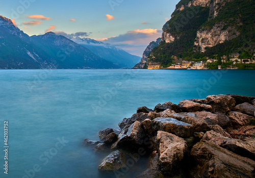 View of the beautiful Lake Garda surrounded by mountains,Riva del garda and Garda lake in the spring time,Trentino Alto Adige region, Soft focus due to long exposure shot
