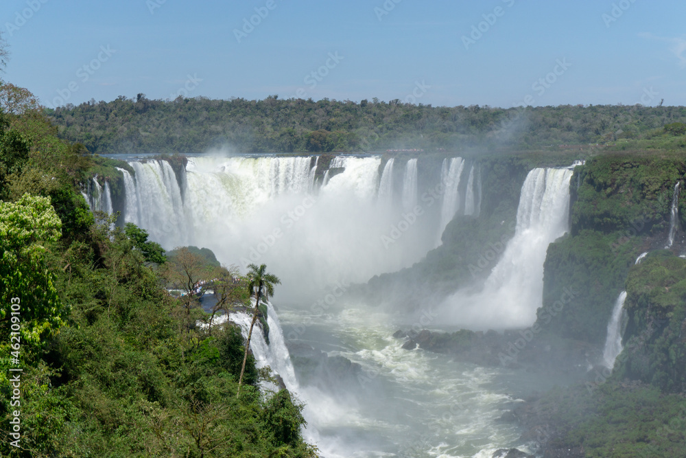 Iguazu Falls, located on the border of Argentina and Brazil, is the largest waterfall in the world. Iguazu Falls, located on the border of Argentina and Brazil, is the largest waterfall in the world.