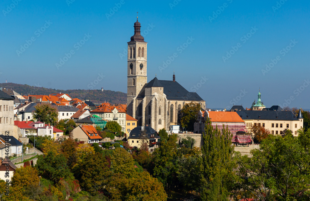 View of medieval Roman Catholic Church of St. James in historical centre of small Czech town of Kutna Hora in autumn day