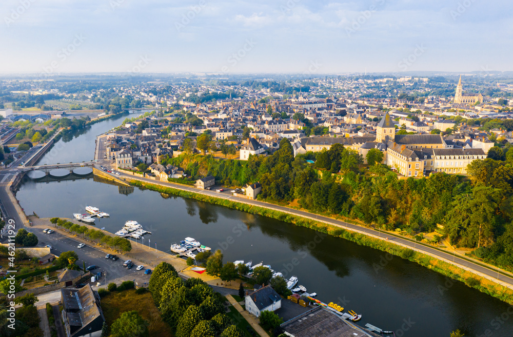Fototapeta premium Scenic aerial view of Chateau-Gontier-sur-Mayenne commune in Mayenne department, northwestern France