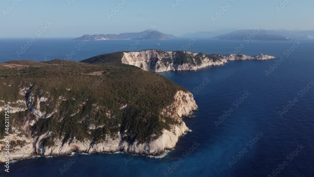 Aerial: Ionian island into Mediterranean Sea at Lefkada, Greece - drone top wide shot Aerial: Ionian island into Mediterranean Sea at Lefkada, Greece - drone top wide shot