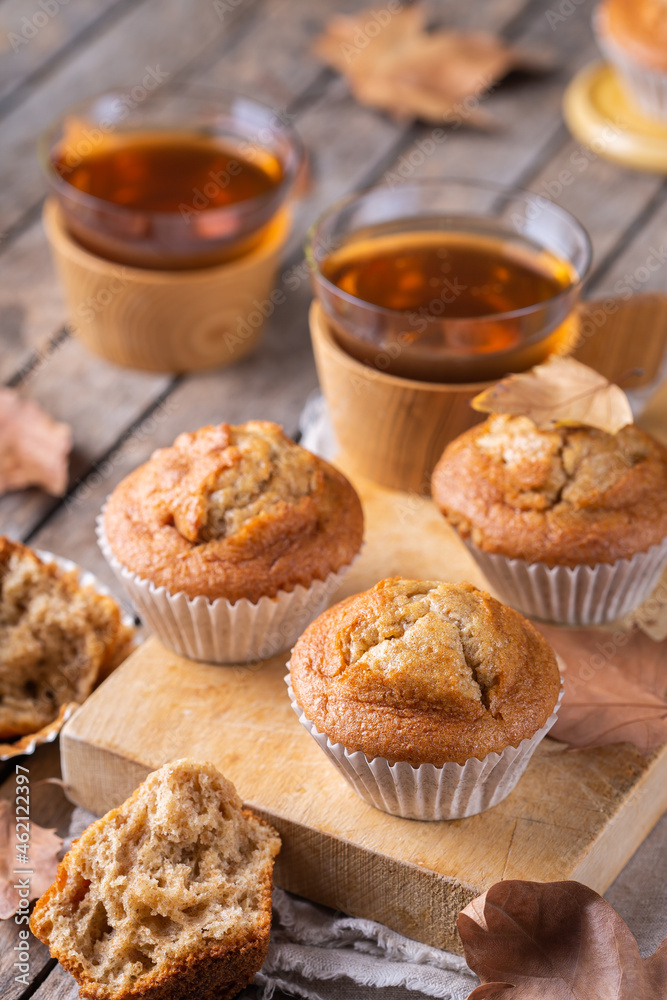 Homemade autumn cakes or muffins with nuts and spices Homemade autumn cakes or muffins with nuts and spices