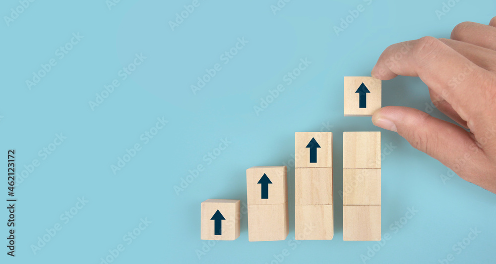 Wooden blocks chart steps with copy space. The business growth process Wooden blocks chart steps with copy space. The business growth process