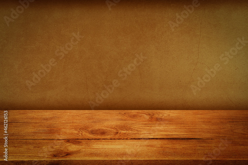 The background is blank wooden boards and a textured plastered wall with lighting and vignetting.