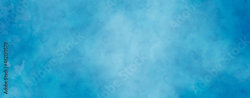 Creative sky blue background with soft puffy cloudy white center with faded vintage textured border