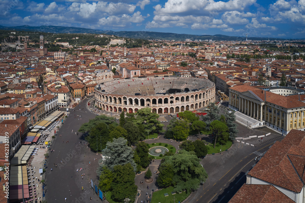 Verona, Italy aerial view of the historic city. Aerial panorama of the famous Piazza Bra in Verona. Monument to Unesco Arena di Verona in Italy top view. Famous Italian amphitheater aerial view.