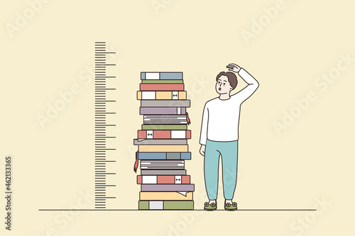 Boy stand near pile of books measuring growth by hand. Guy reading studying and learning with textbooks. Good education, knowledge and achievement concept. Flat vector illustration.