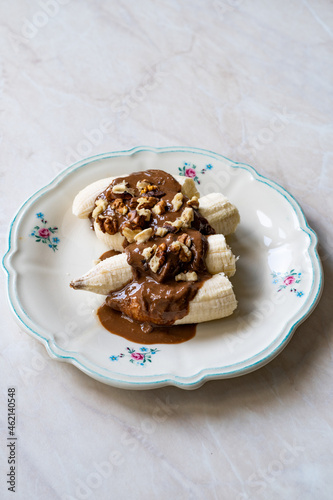 Banana with Homemade Creamy Peanut Butter and Walnuts.