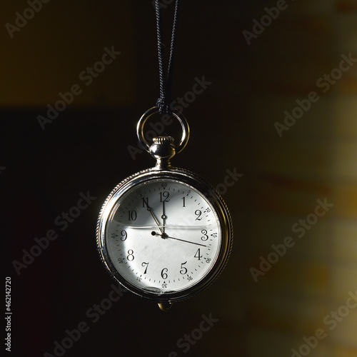 vintage pocket watch dial with arabic numerals