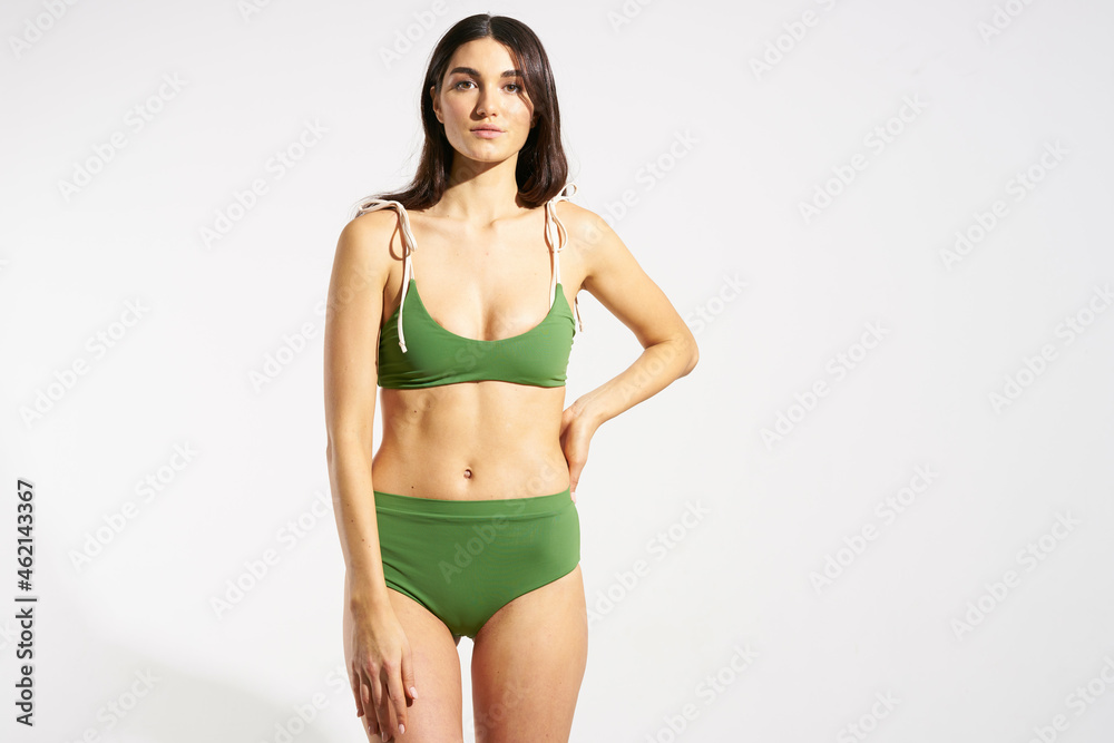 Fototapeta premium woman in green swimwear beach fashion travel posing
