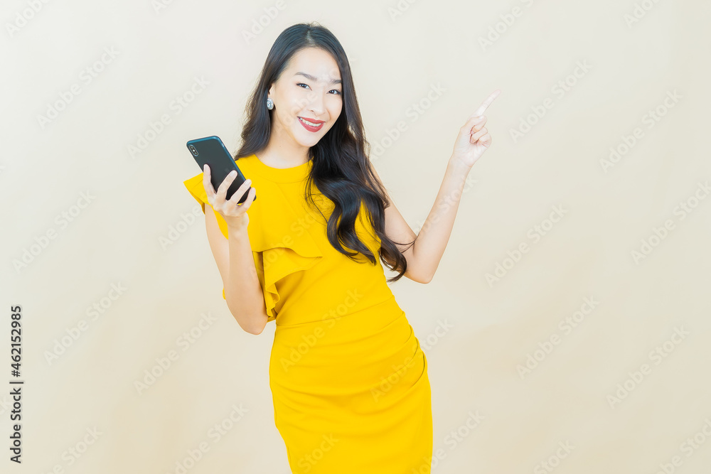 Portrait beautiful young asian woman smile with smart mobile phone Portrait beautiful young asian woman smile with smart mobile phone