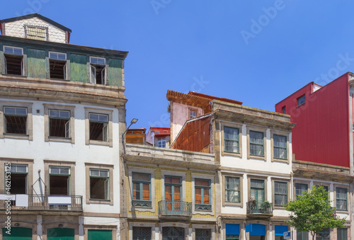 Beautiful old houses in the city center on Rua Mouzinho da Silveira street. Porto, Portugal photo