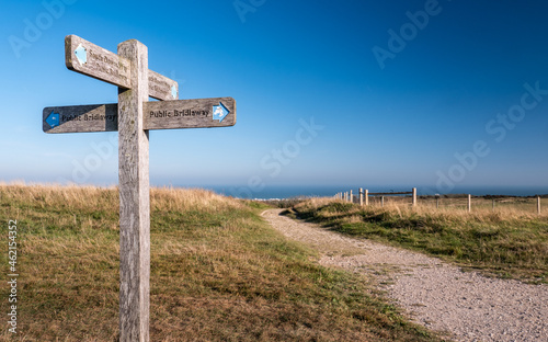 The South Downs Ways, Sussex, England. A signpost giving directions along the 100 mile walking route between Winchester and Eastbourne, South England.
