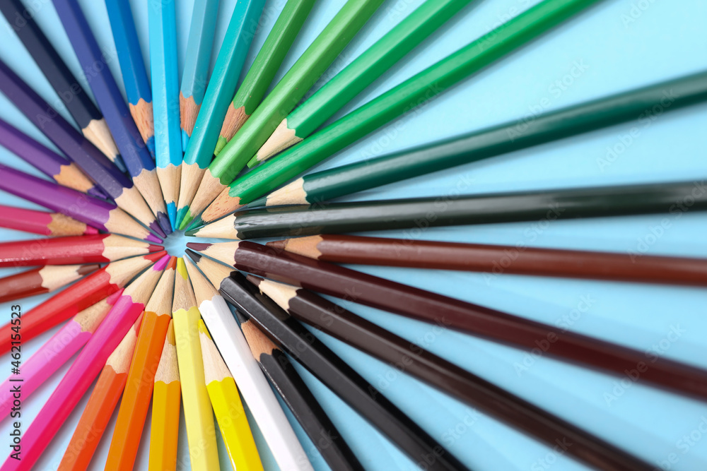 Set of color pencil arranged in a circle on blue background. Set of color pencil arranged in a circle on blue background.
