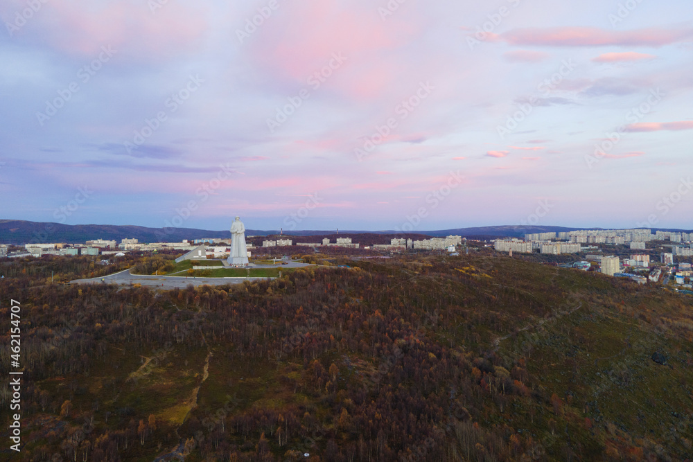 Aerial view panorama of city monument Defenders of Soviet Arctic Alyosha .