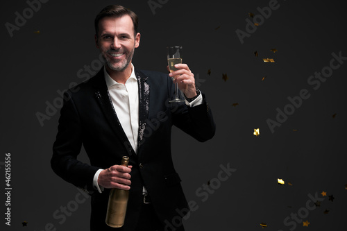 Elegance man with glass of champagne