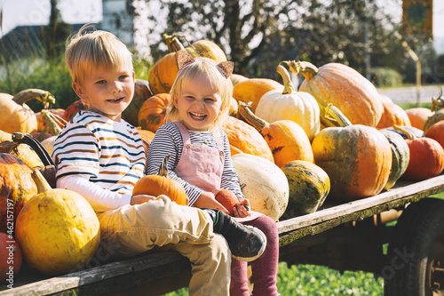 Obraz na płótnie Family with kids at fall season