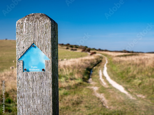 The South Downs Way signpost marking the public footpath which runs 100 miles along the south coast of England between Eastbourne and Winchester.