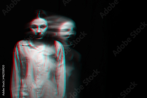 blurry scary portrait of a witch ghost girl in a white shirt. Black and white with 3D glitch virtual reality effect