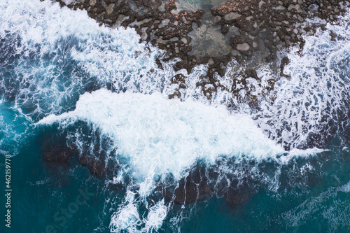 Aerial view of waves splashing on beach © 26max