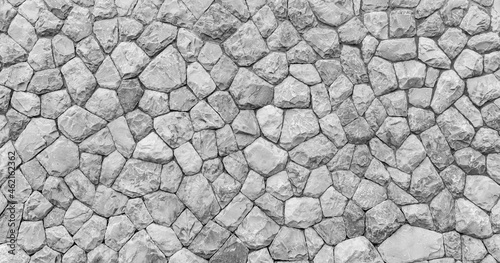 Panorama of White natural stone wall pattern and background texture