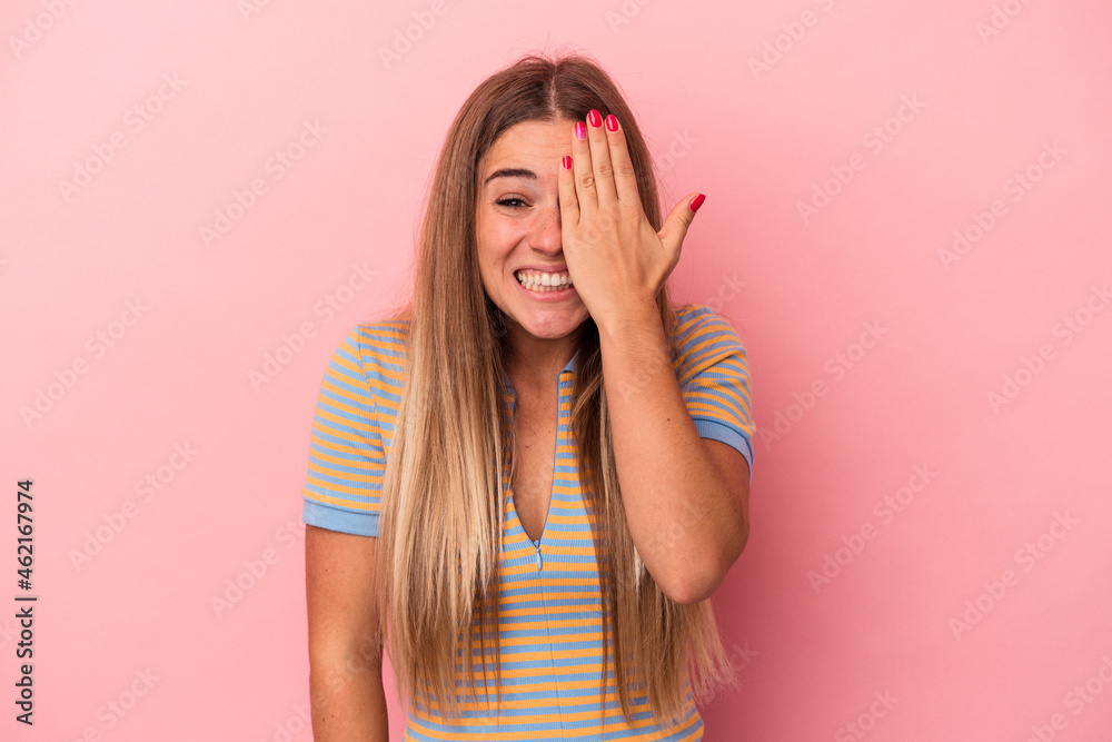 Young Russian woman isolated on pink background suffering neck pain due to sedentary lifestyle. Young Russian woman isolated on pink background suffering neck pain due to sedentary lifestyle.