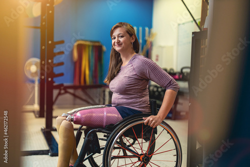 Fotografie Woman with prosthetic legs in wheelchair