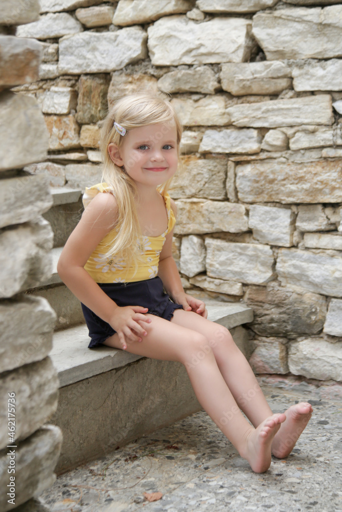 Portrait of cute toddler girl with long blonde hair Portrait of cute toddler girl with long blonde hair