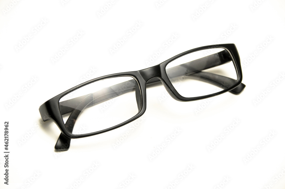 Reading glasses with black frames on a white background Reading glasses with black frames on a white background