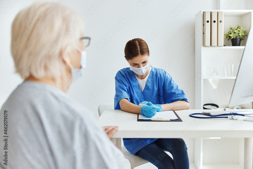 female doctor patient examination medical office