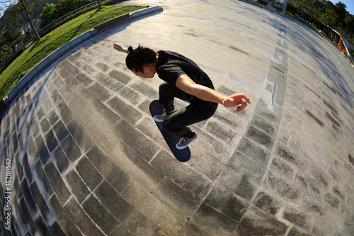 Skateboarder skateboarding outdoors in city photo