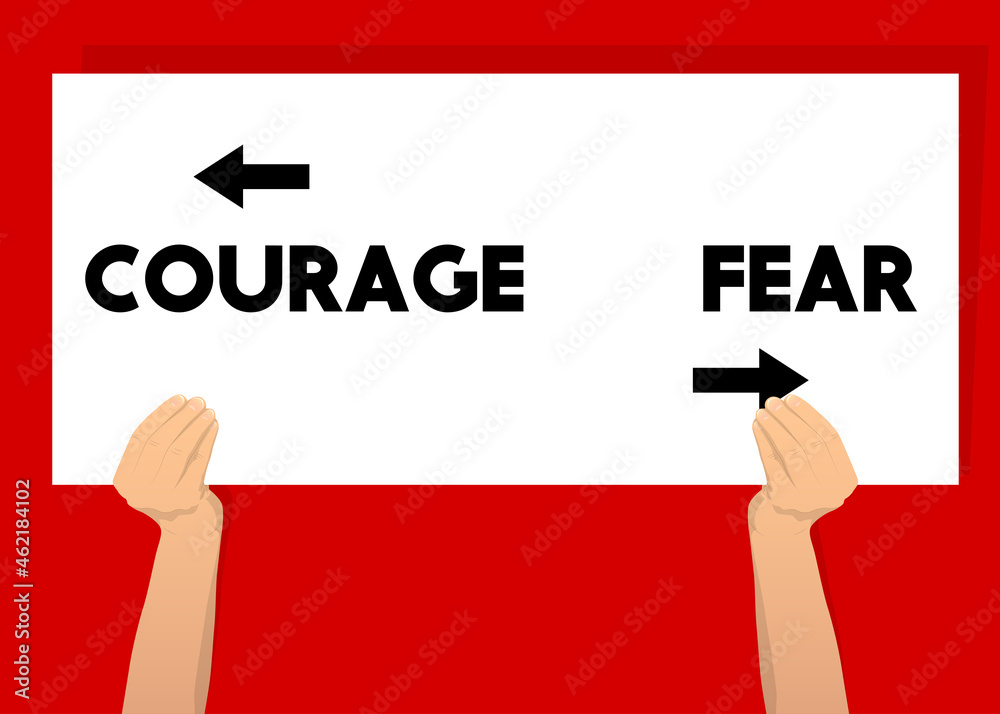 Hand holding banner with Courage and fear text with arrows on white ...