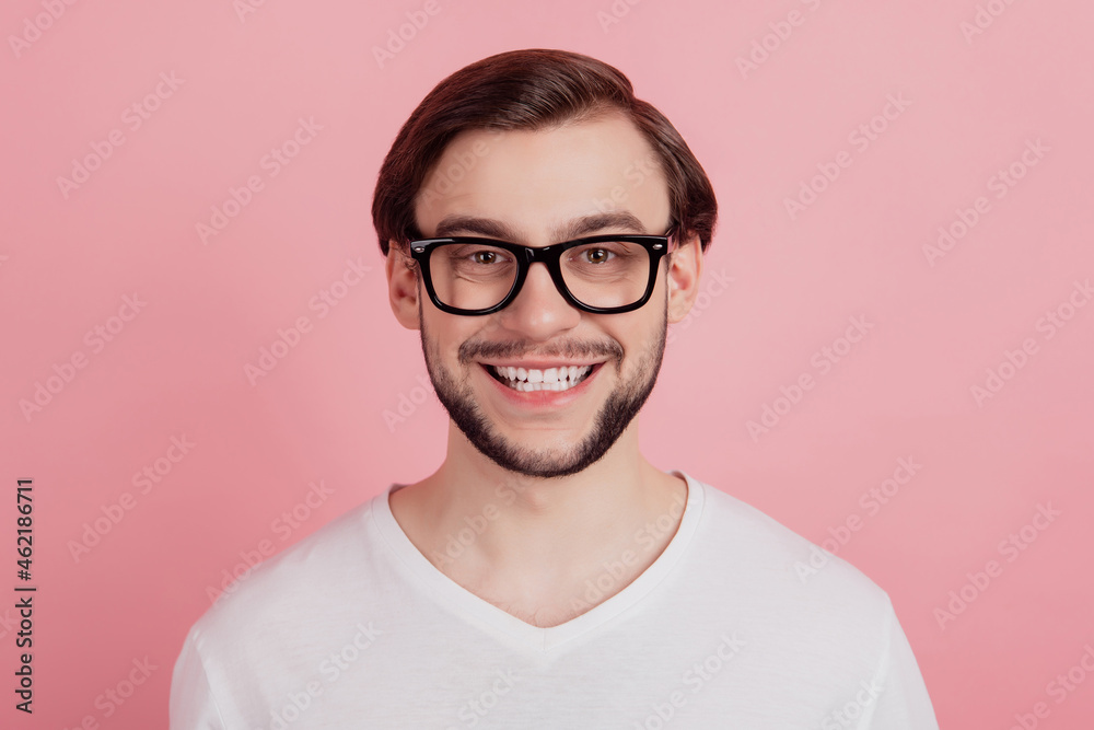 Portrait of handsome worker geek guy wear eyewear toothy shiny smile on pink background