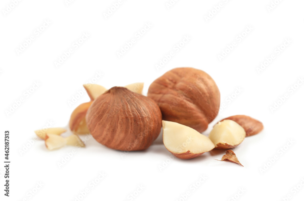 Heap of tasty hazelnuts on white background Heap of tasty hazelnuts on white background