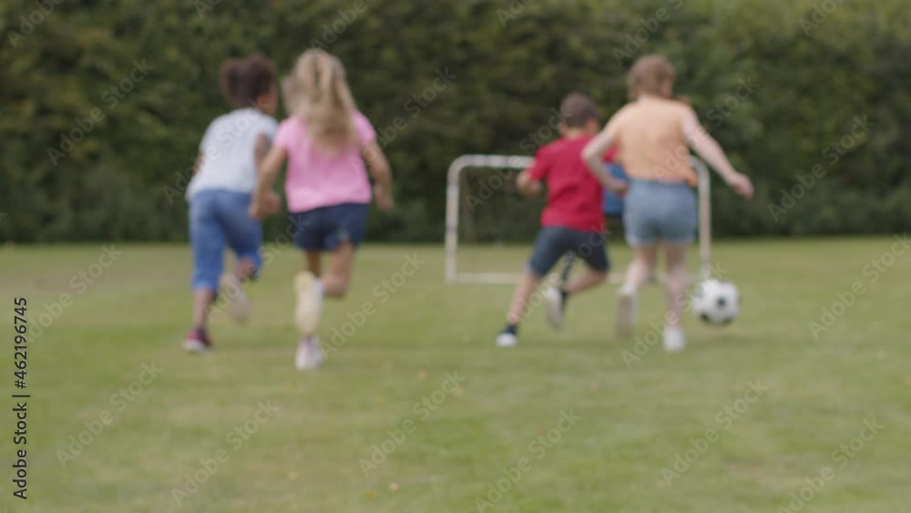 Tracking Shot of Group of Children Playing Football 08 Tracking Shot of Group of Children Playing Football 08