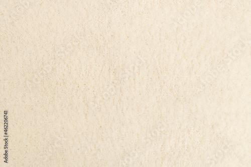 Beige textured fabric background with design space