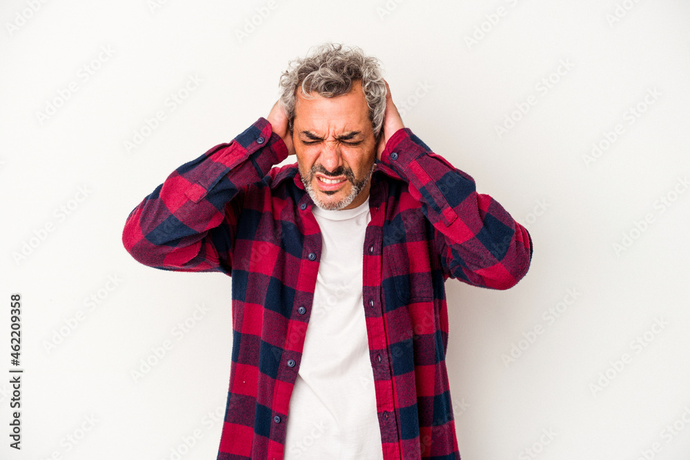 Middle age caucasian man isolated on white background covering ears with hands. Middle age caucasian man isolated on white background covering ears with hands.