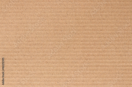 Brown cardboard sheet abstract background, texture of recycle paper box in old vintage pattern for design art work.