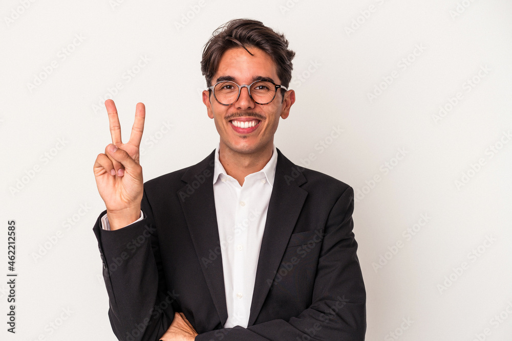 Young mixed race business man isolated on white background showing number two with fingers. Young mixed race business man isolated on white background showing number two with fingers.