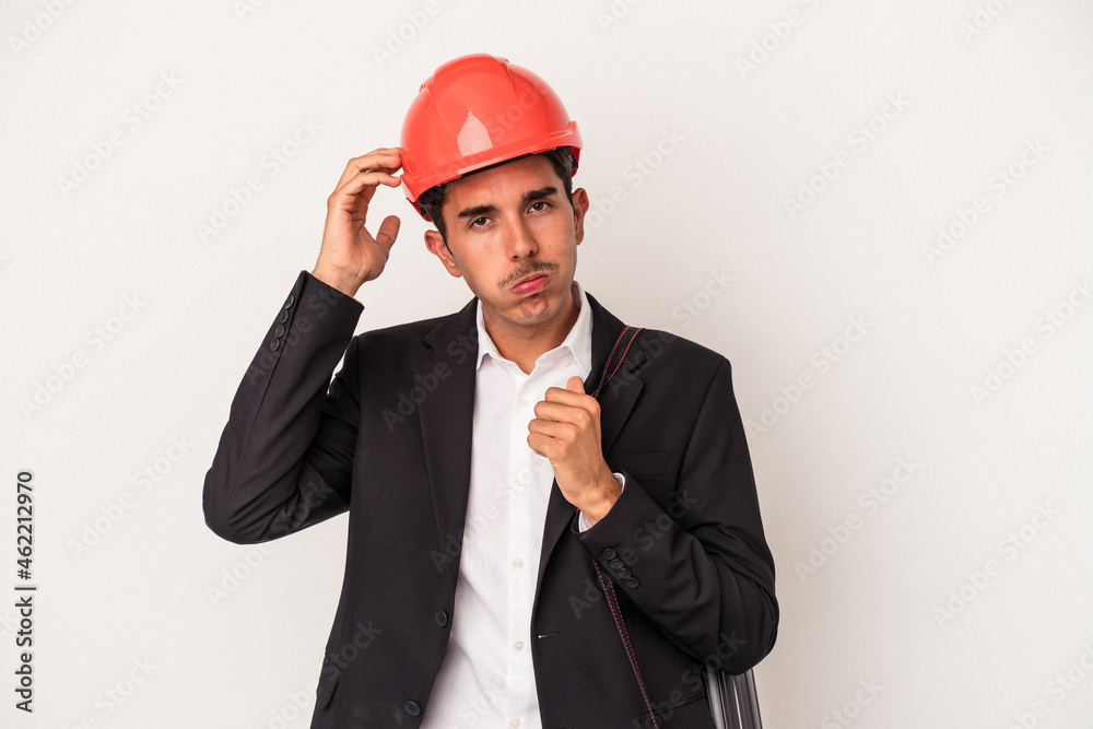 Young architect mixed race man isolated on white background being shocked, she has remembered important meeting. Young architect mixed race man isolated on white background being shocked, she has remembered important meeting.