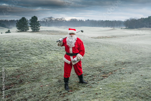 Santa Claus on a golf course in winter frost in the Netherlands