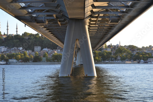 Under bridge on water. Halic bridge on Golden Horn waterway in Istanbul,Turkey.