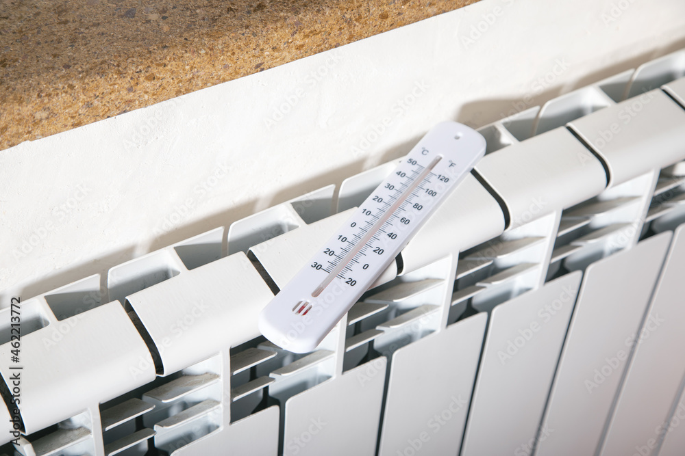 Thermometer on the heating radiator. Thermometer on the heating radiator.