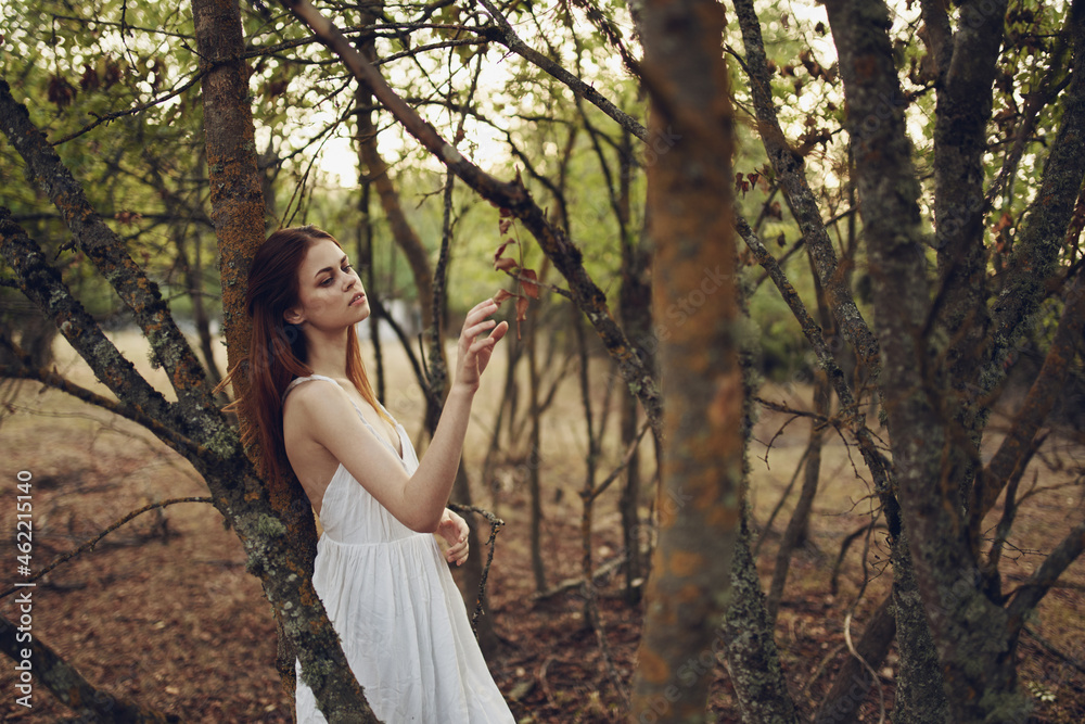 Woman in white dress near trees summer vacation fresh air Woman in white dress near trees summer vacation fresh air