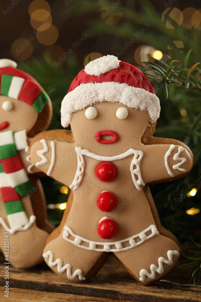 Delicious homemade Christmas cookies on wooden table against blurred festive lights Delicious homemade Christmas cookies on wooden table against blurred festive lights