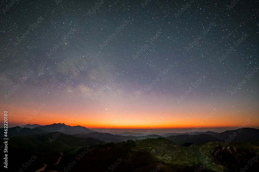 Panorama view universe space shot of milky way galaxy with stars on night sky background at mountains landscape Thailand