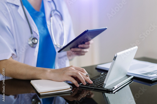 Medicine doctor hand working with modern digital tablet computer interface as medical